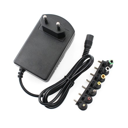 Універсальні регульований імпульсний адаптер блок живлення 3 A 30 W 3/4.5/6/7.5/9/12V + 7 штекерів!
